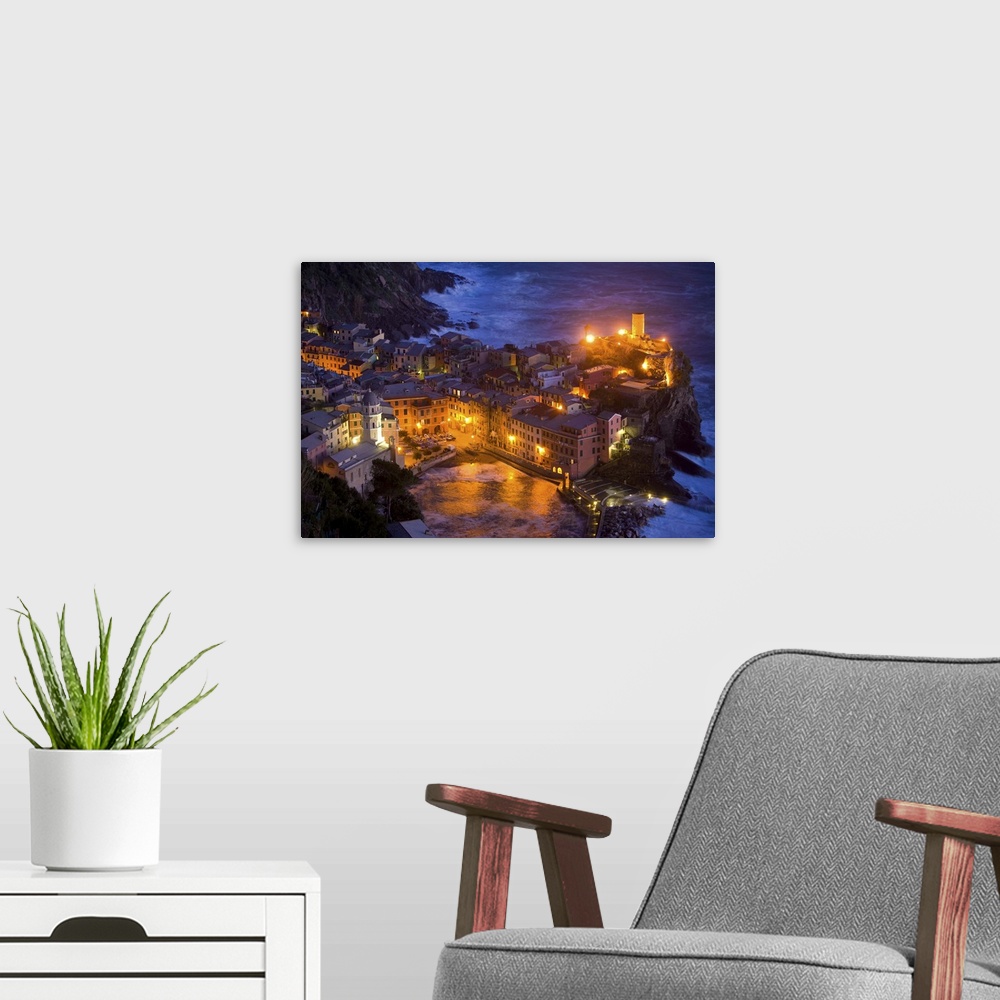 A modern room featuring Europe, Italy, Vernazza, Cinque Terra. Overview of city lit at night.