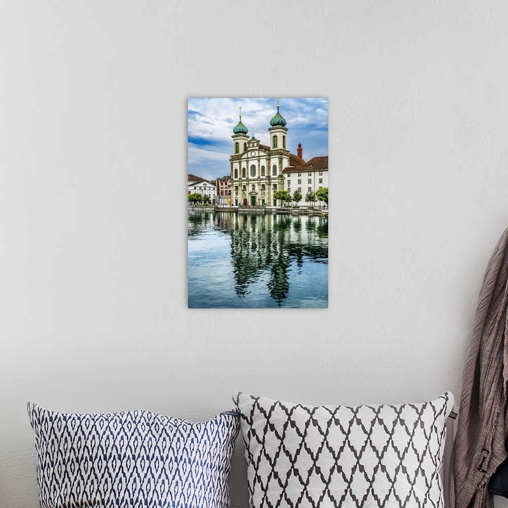 A bohemian room featuring Jesuit Church Inner Harbor reflection, Lucerne, Switzerland.
