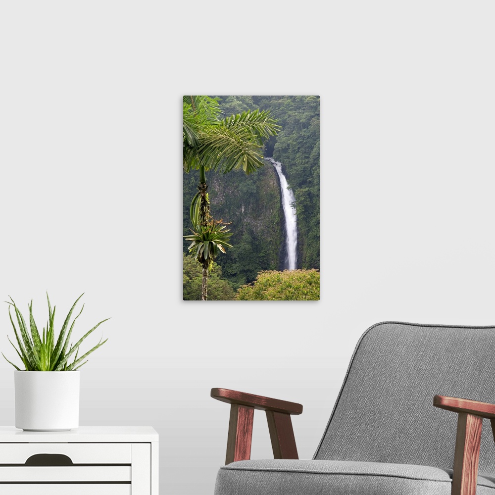 A modern room featuring La Fortuna Waterfall in the Arenal Volcano National Park near La Fortuna, San Carlos, Costa Rica.