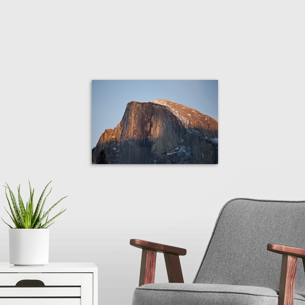 A modern room featuring Last light falls on Half Dome as the sun sets, Yosemite National Park, California.