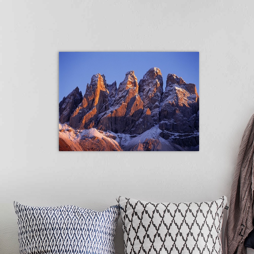 A bohemian room featuring Europe, Italy, Odle Group. Late light rests on the craggy, snow-dusted peaks of the Odle Group, i...