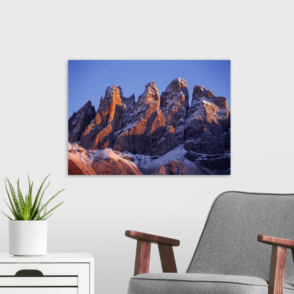 A modern room featuring Europe, Italy, Odle Group. Late light rests on the craggy, snow-dusted peaks of the Odle Group, i...