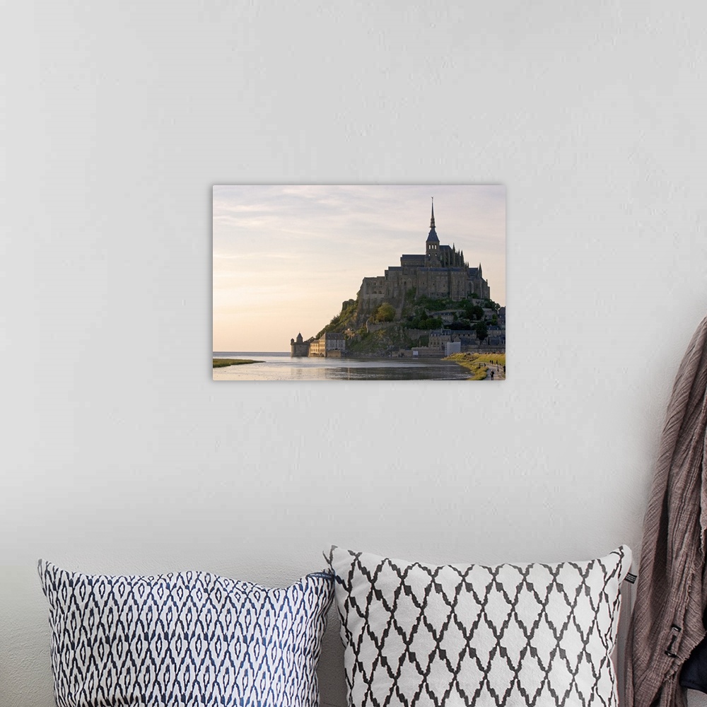 A bohemian room featuring Le Mont Saint Michel at sunset in the region of Basse-Normandie, France.