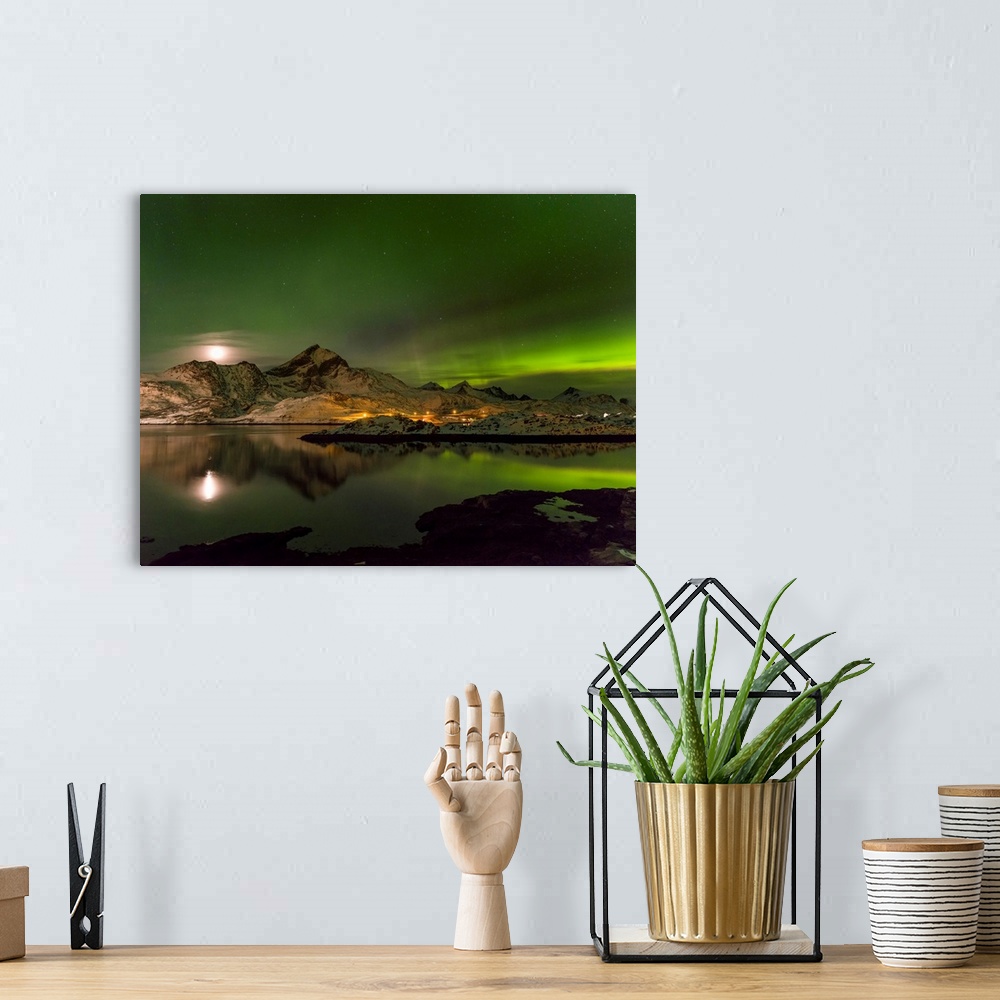 A bohemian room featuring Aurora Borealis. View from Flakstadoya towards Moskenesoya with the bridge over the Kakersundet. ...
