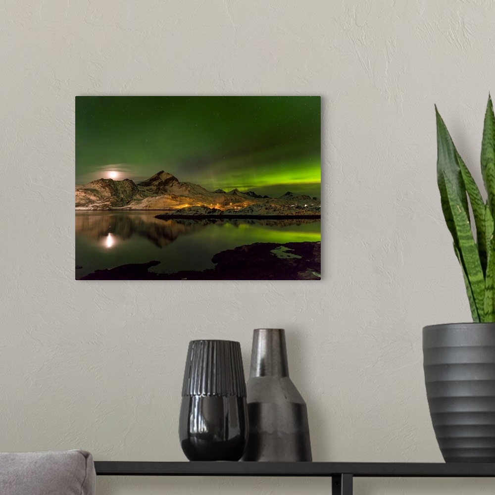 A modern room featuring Aurora Borealis. View from Flakstadoya towards Moskenesoya with the bridge over the Kakersundet. ...
