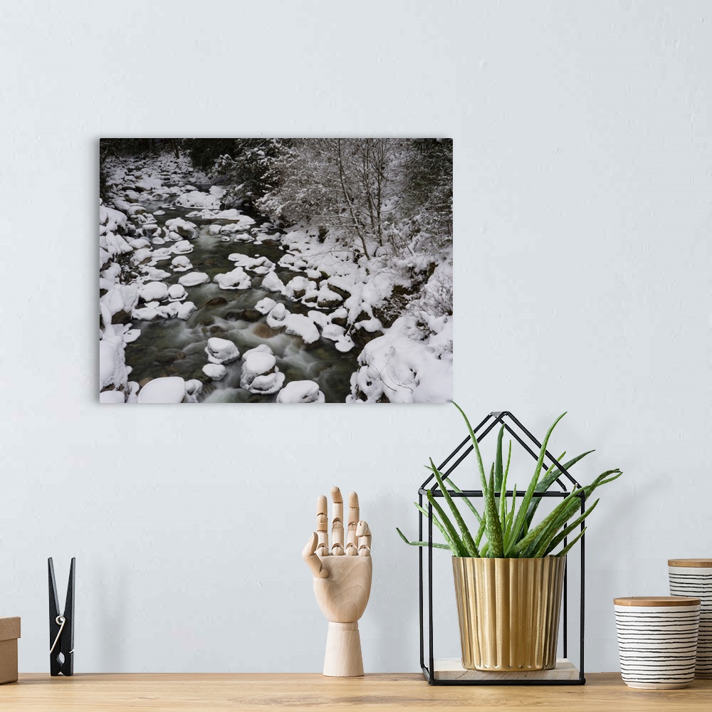 A bohemian room featuring Long exposure of river in winter in Squamish, British Columbia, Canada