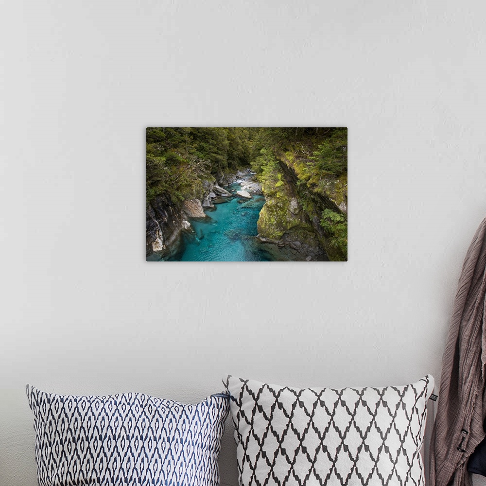 A bohemian room featuring Makarora, New Zealand. The Blue Pools of Makarora offer enticing blue waters to swim in.