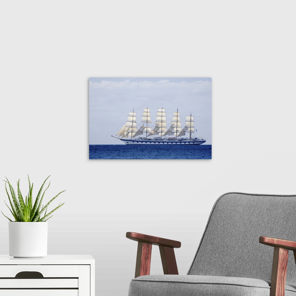 A modern room featuring MARTINIQUE. French Antilles. West Indies. Sailing cruise ship of Star Clippers line under sail in...