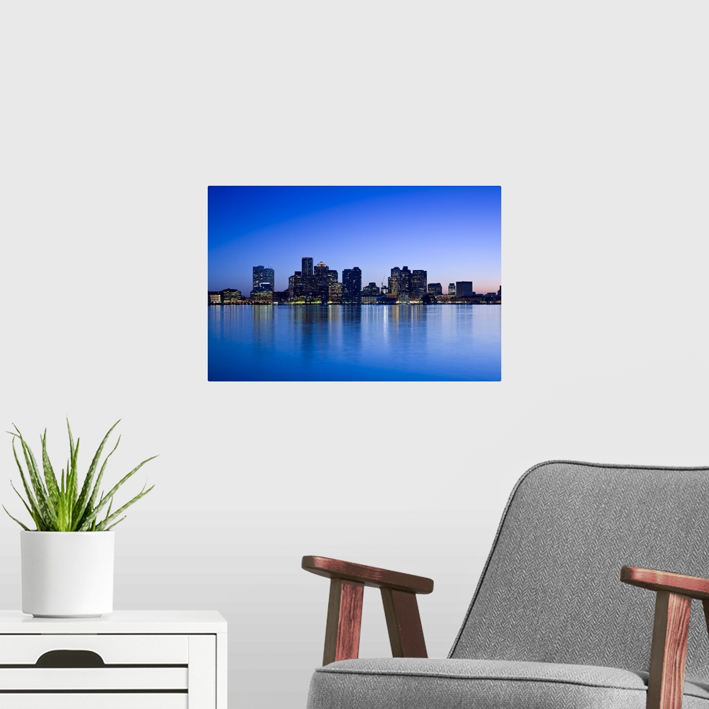 A modern room featuring USA, Massachusetts, Boston. Financial District from East Boston, dusk.