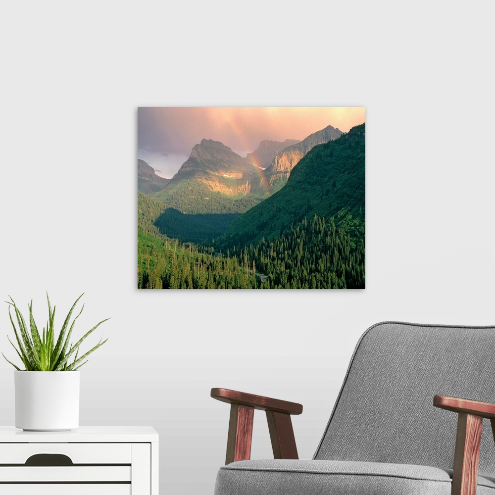 A modern room featuring USA, Montana, Glacier NP. A rainbow graces the mountains seen from Going-to-the-Sun Highway, Glac...