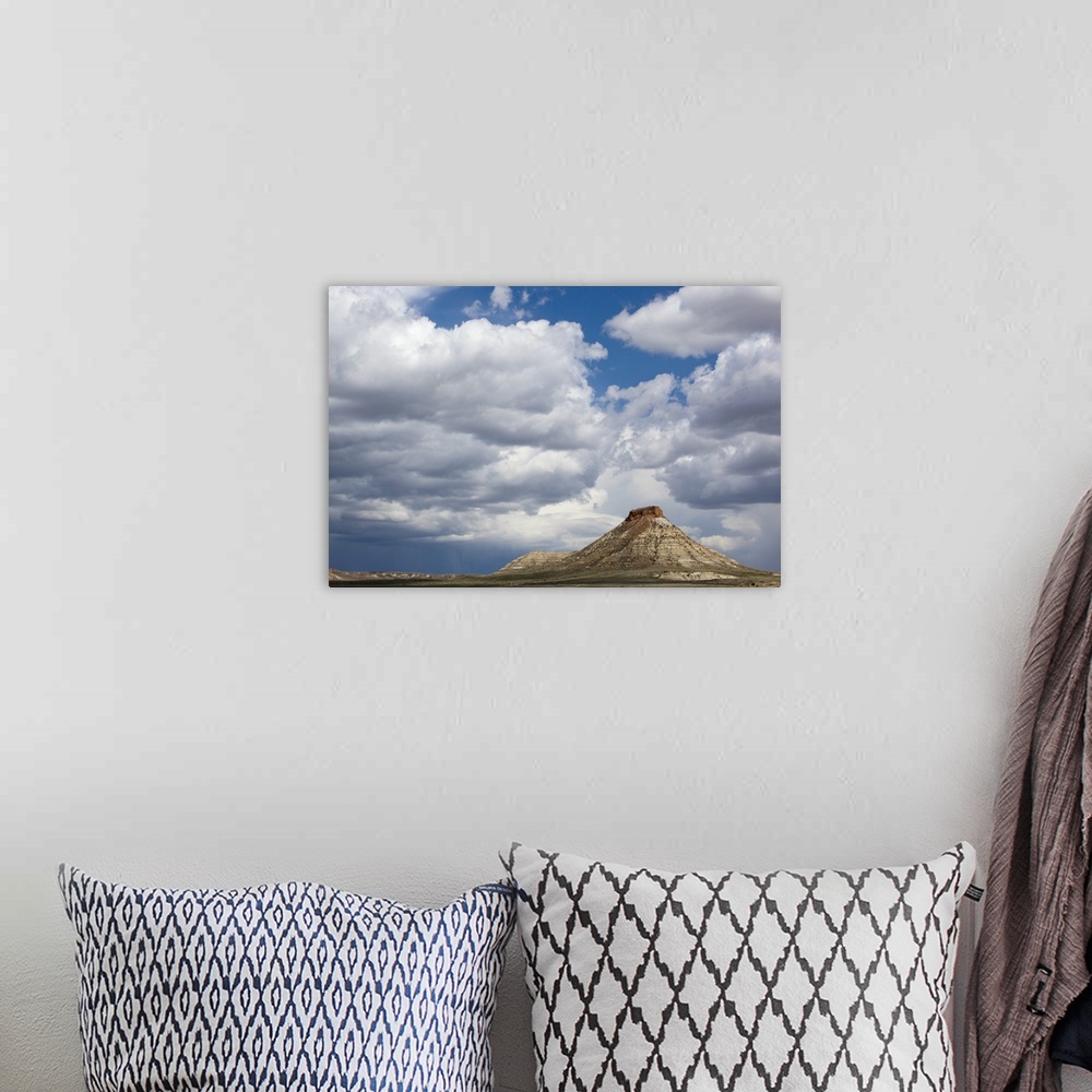 A bohemian room featuring USA, Montana, Terry, Gathering storm clouds over hoodoo in badlands of eastern Montana