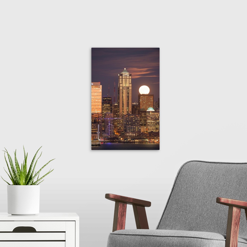 A modern room featuring Moonrise behind the downtown Seattle skyline, Seattle, WA
