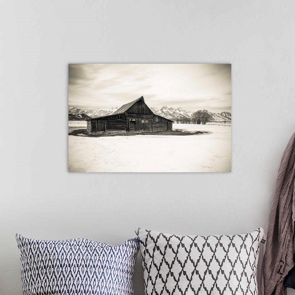 A bohemian room featuring Moulton Barn and Tetons in winter, Grand Teton National Park, Wyoming USA