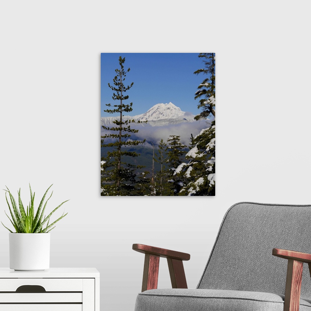 A modern room featuring Mount Garibaldi from The Chief overlook at the summit of the Sea to Sky Gondola