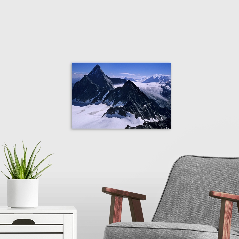 A modern room featuring Mount Sir Donald (left) viewed from Avalanche Peak in the Columbia Mountains of Glacier National ...