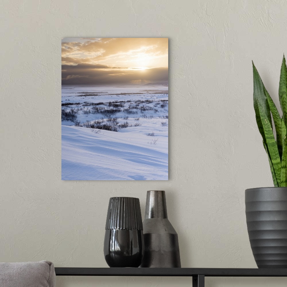 A modern room featuring Mountains of Iceland during winter near Laugarvatn, Iceland.