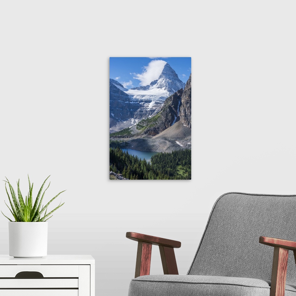 A modern room featuring Mt. Assiniboine and Sunburst Lake as seen from the Nublet.