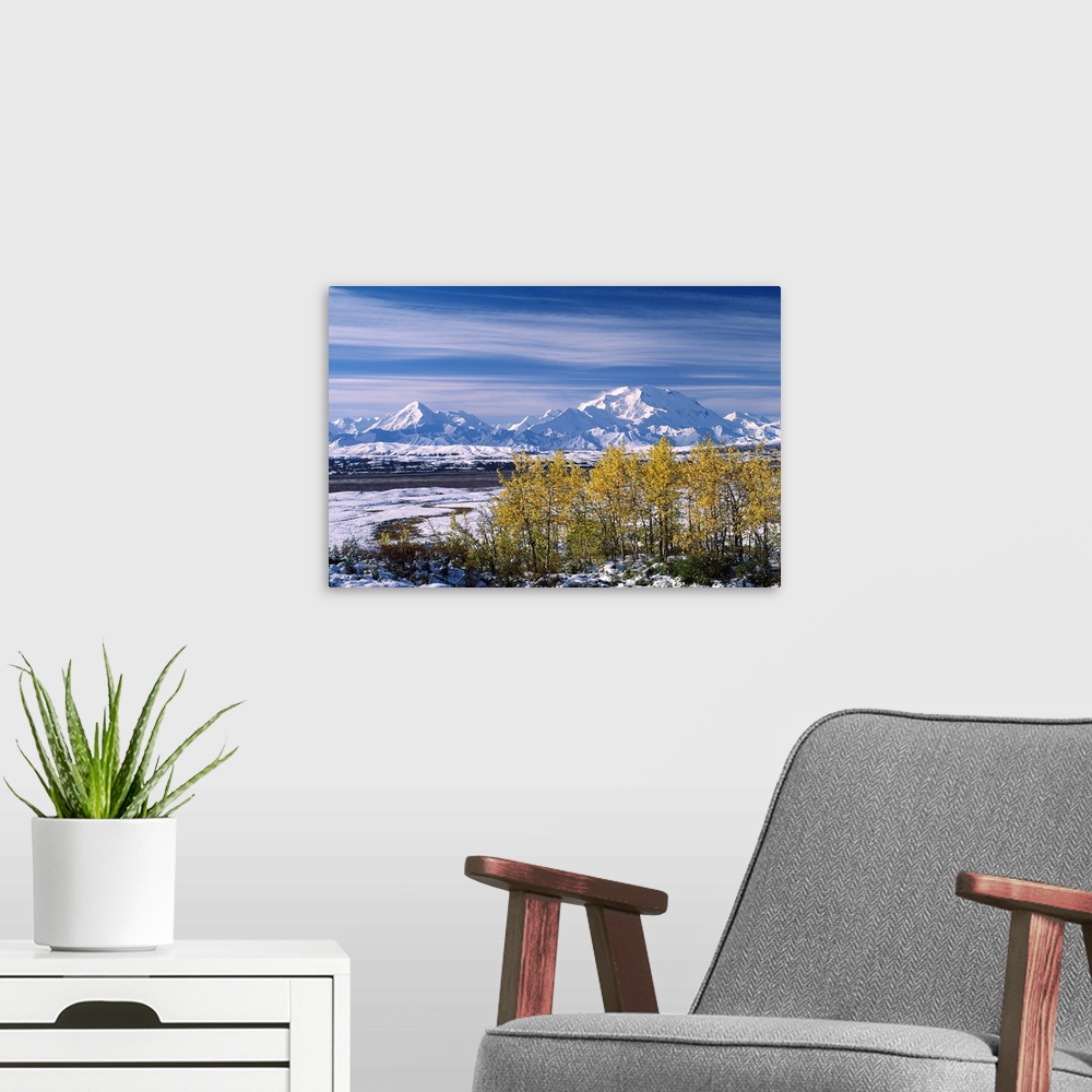 A modern room featuring The end of the summer at Mt. Denali. The first snow fall of the season in the first week of Septe...