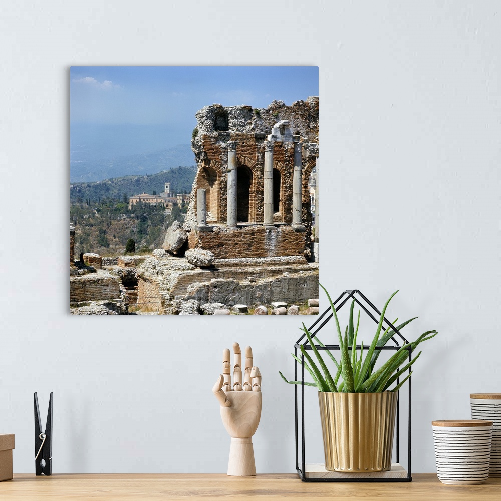 A bohemian room featuring Italy, Sicily, Taormina. Smoke from erupting Mt. Etna is visible from the Greek Theater in Taormi...