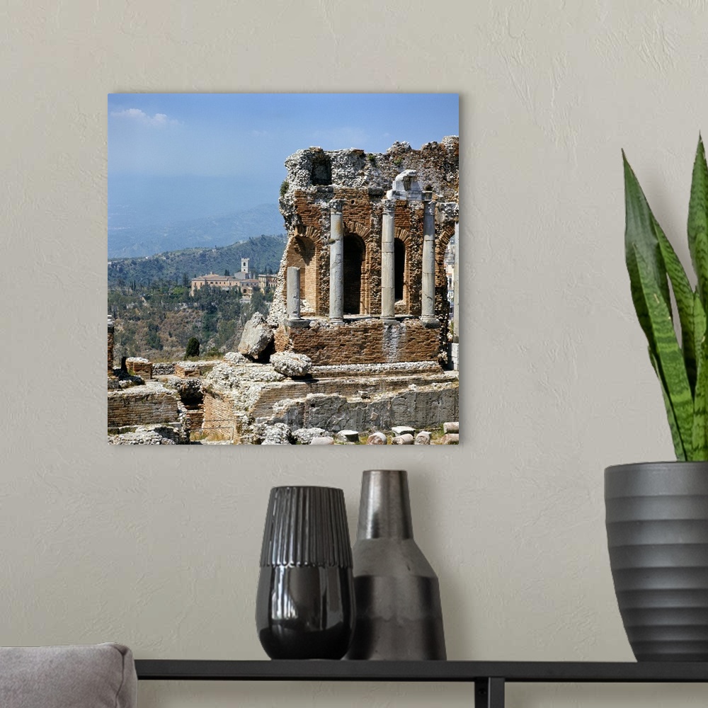 A modern room featuring Italy, Sicily, Taormina. Smoke from erupting Mt. Etna is visible from the Greek Theater in Taormi...