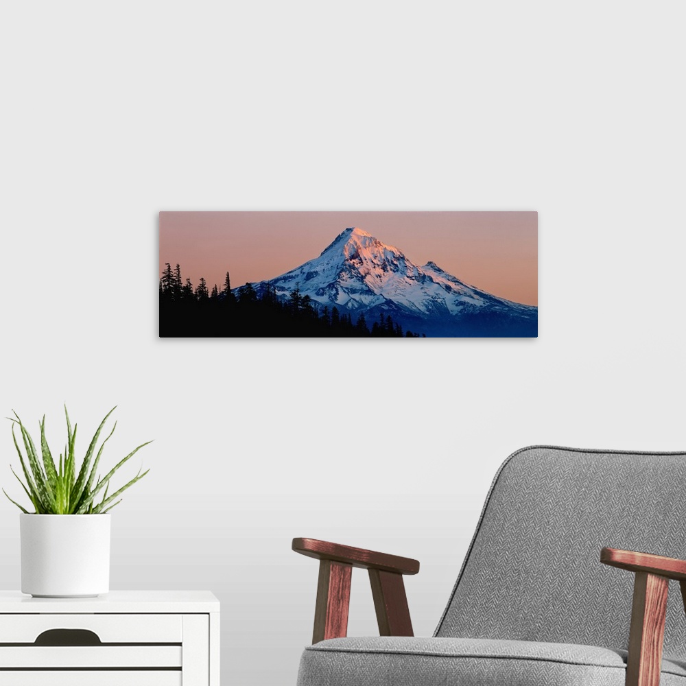 A modern room featuring USA, Oregon, Mt Hood. Mt Hood reflects the light from the setting sun in the Cascades Range, Oregon.