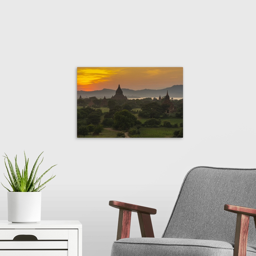 A modern room featuring Myanmar. Bagan. Sunset over the temples of Bagan.