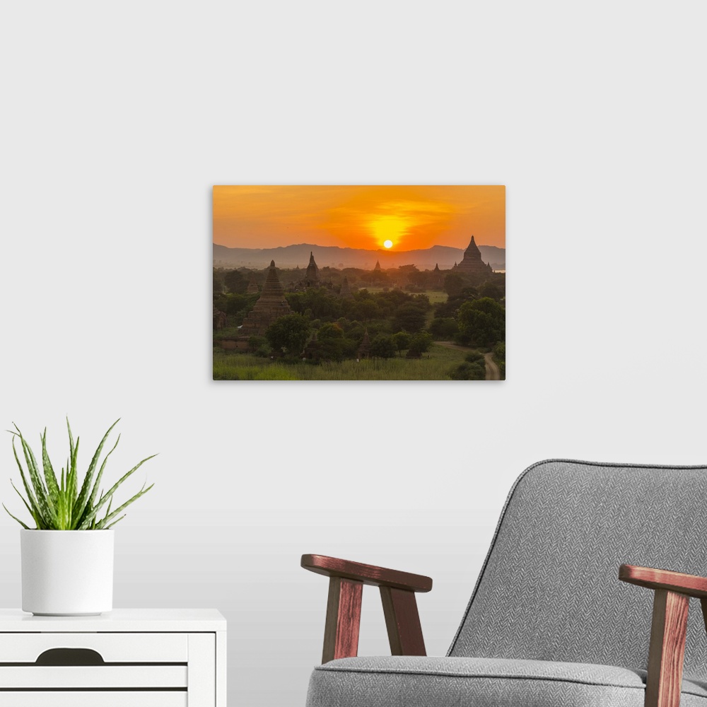 A modern room featuring Myanmar. Bagan. Sunset over the temples of Bagan.