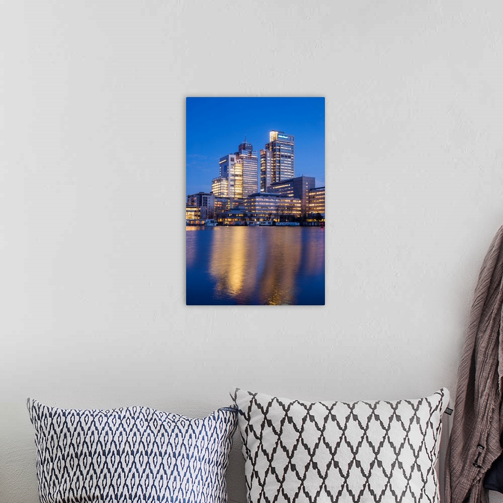 A bohemian room featuring Netherlands, Amsterdam, Omval Commercial District, office towers, dawn.