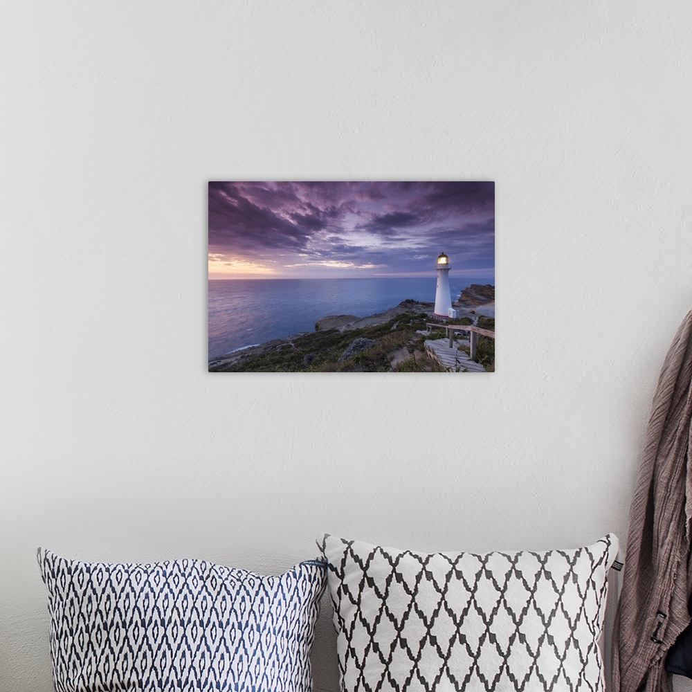 A bohemian room featuring New Zealand, North Island, Castlepoint, Castlepoint Lighthouse, dawn