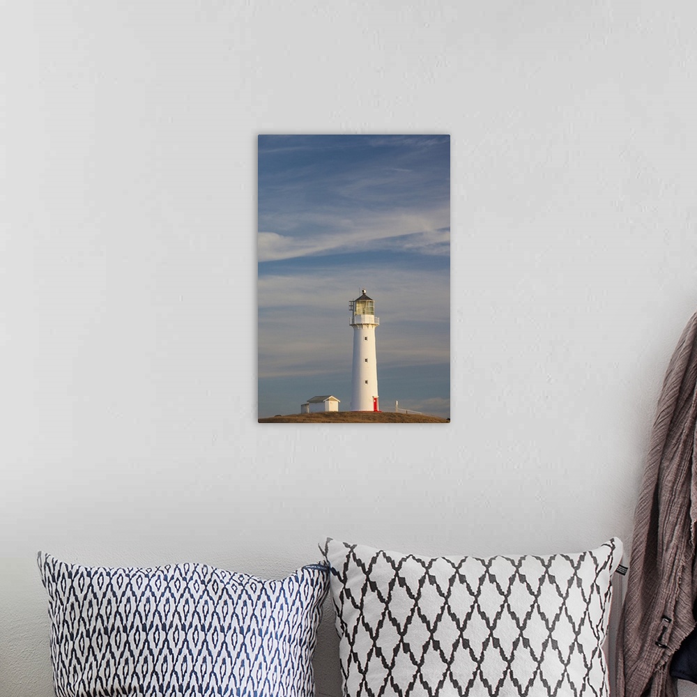 A bohemian room featuring New Zealand, North Island, New Plymouth-area, Pungarehu, Cape Egmont Lighthouse, dusk