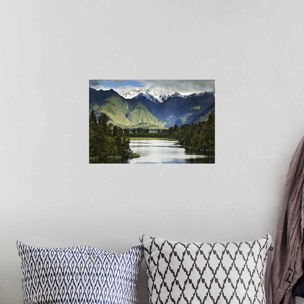 A bohemian room featuring New Zealand, South Island. Cloud-shrouded Mt. Cook as seen from Lake Matheson near the town of Fo...