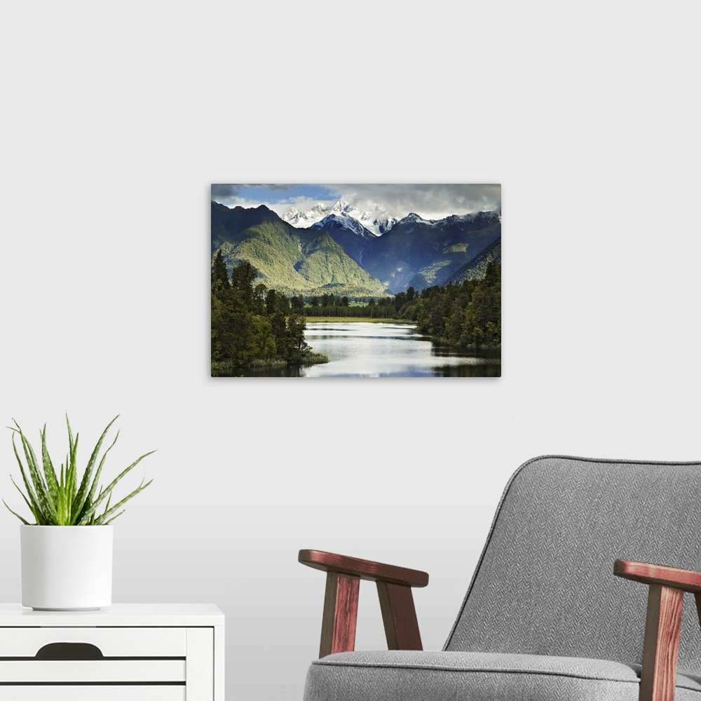 A modern room featuring New Zealand, South Island. Cloud-shrouded Mt. Cook as seen from Lake Matheson near the town of Fo...