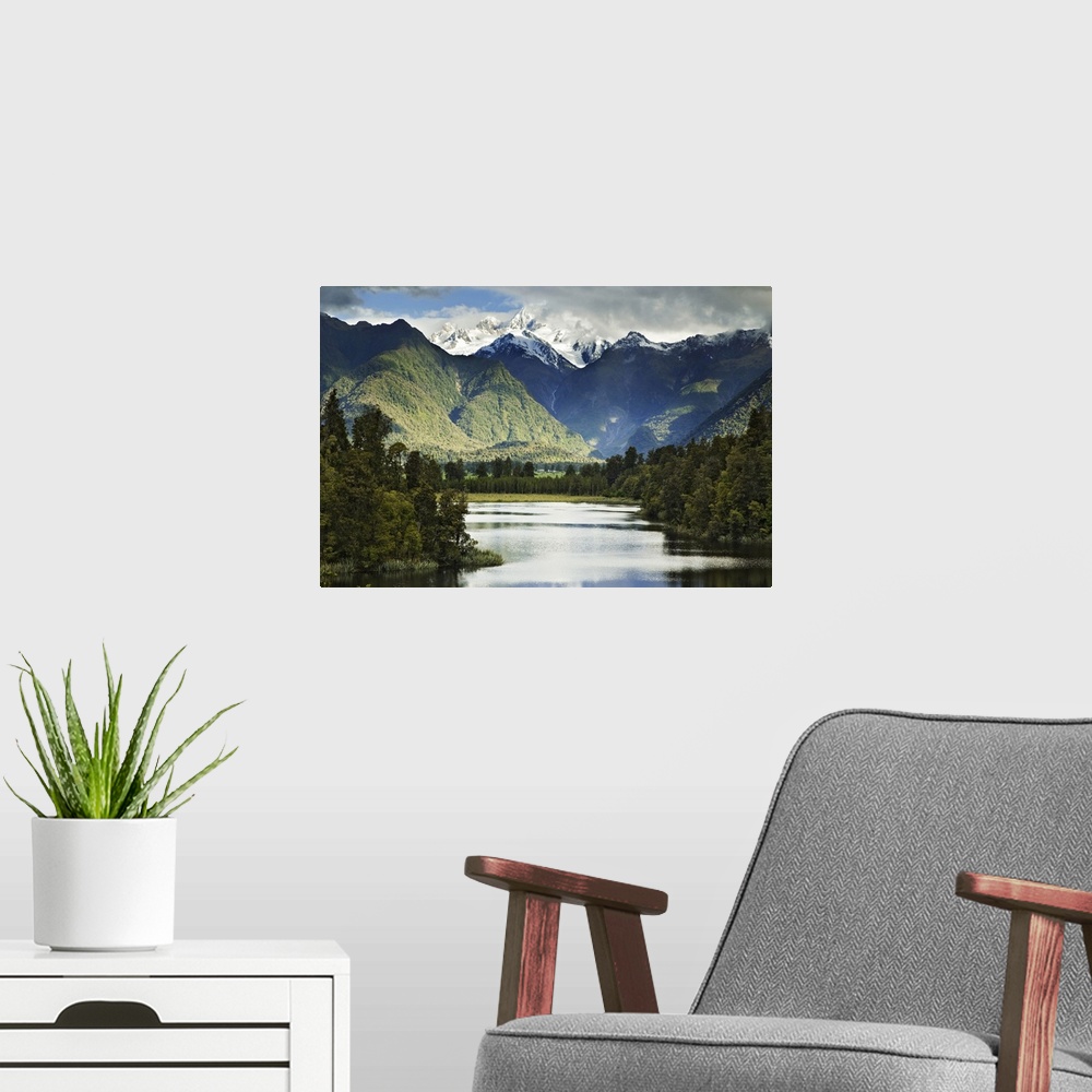 A modern room featuring New Zealand, South Island. Cloud-shrouded Mt. Cook as seen from Lake Matheson near the town of Fo...