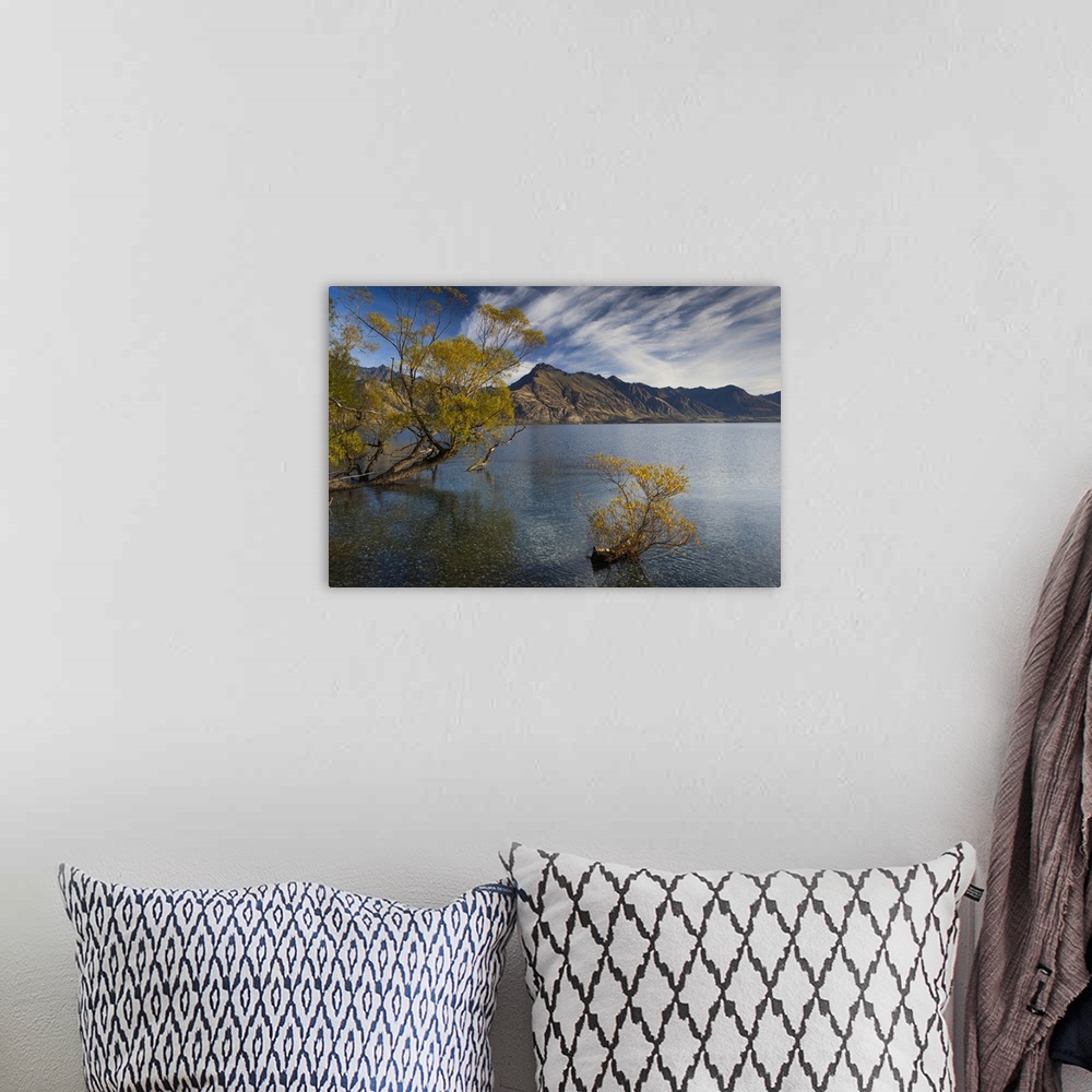 A bohemian room featuring New Zealand, South Island, Otago, Queenstown, mountain landscape on Lake Wakatipu