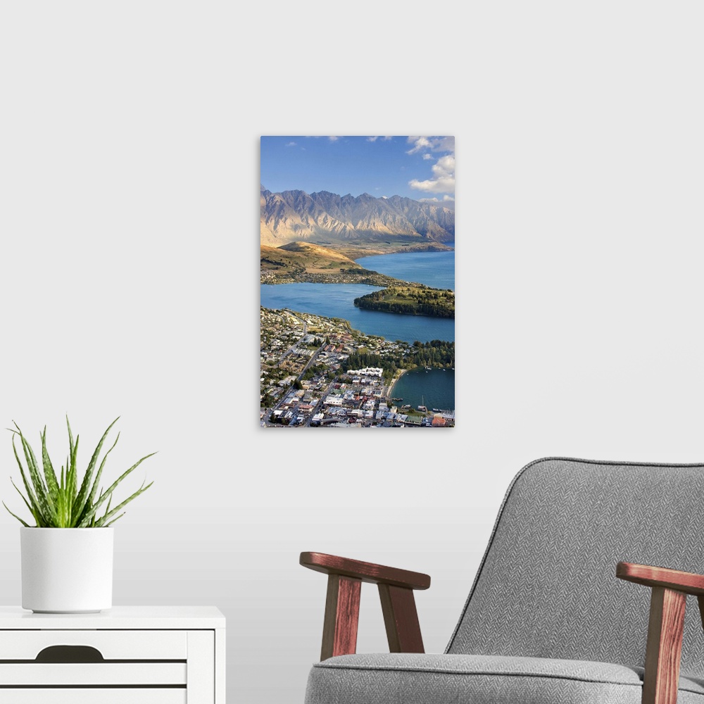 A modern room featuring New Zealand, South Island, View towards Queenstown and Wakatipu Lake with the Formidable Mountain...