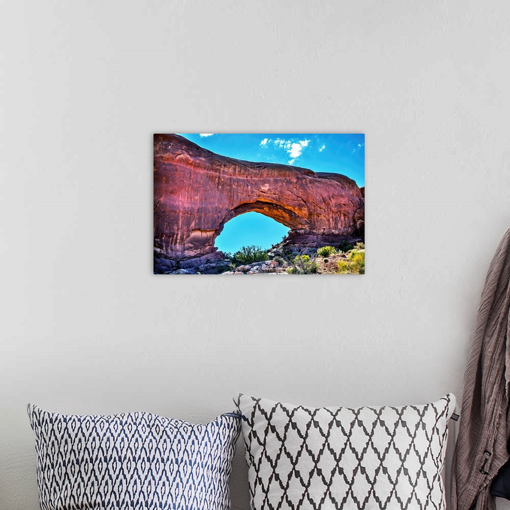 A bohemian room featuring North window Arch Windows Section Arches National Park, Moab, Utah, USA. Red canyon walls and blu...