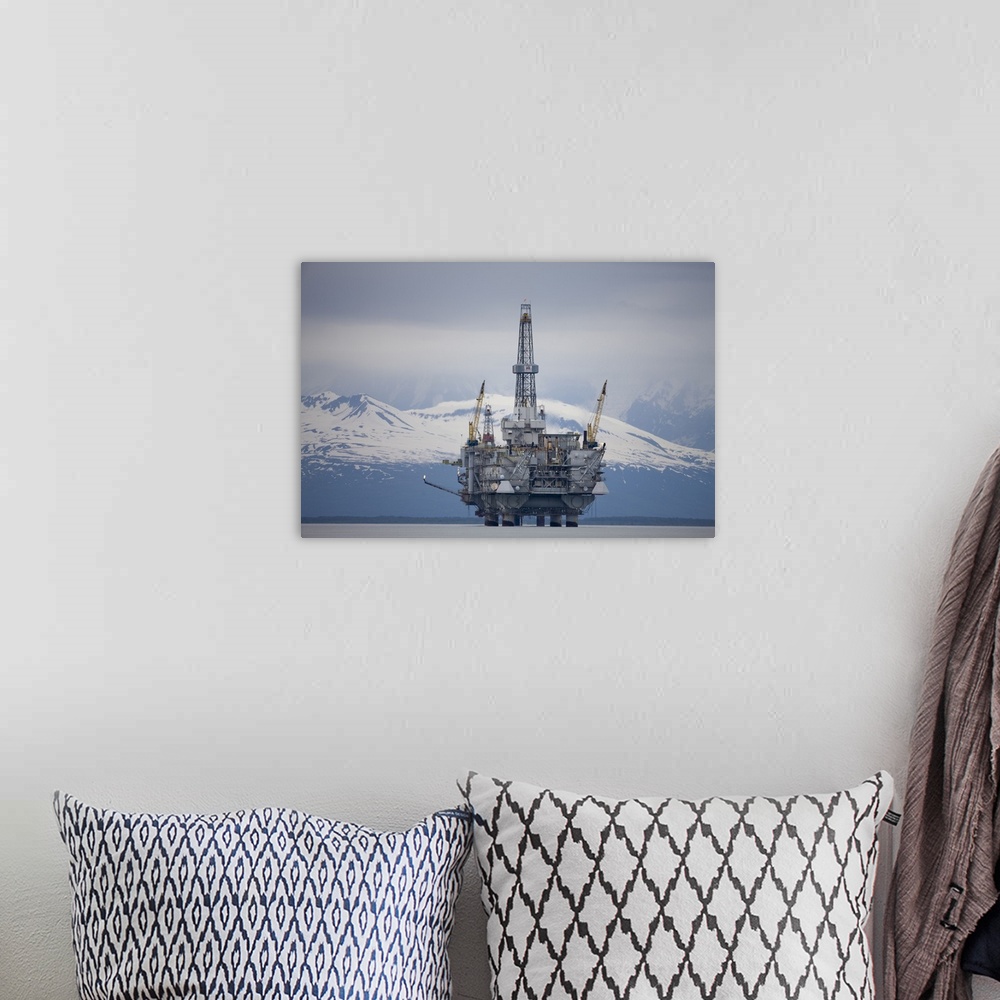 A bohemian room featuring USA, Alaska. Offshore oil drilling rig in Cook Inlet and distant Alaska Range peaks on summer eve...