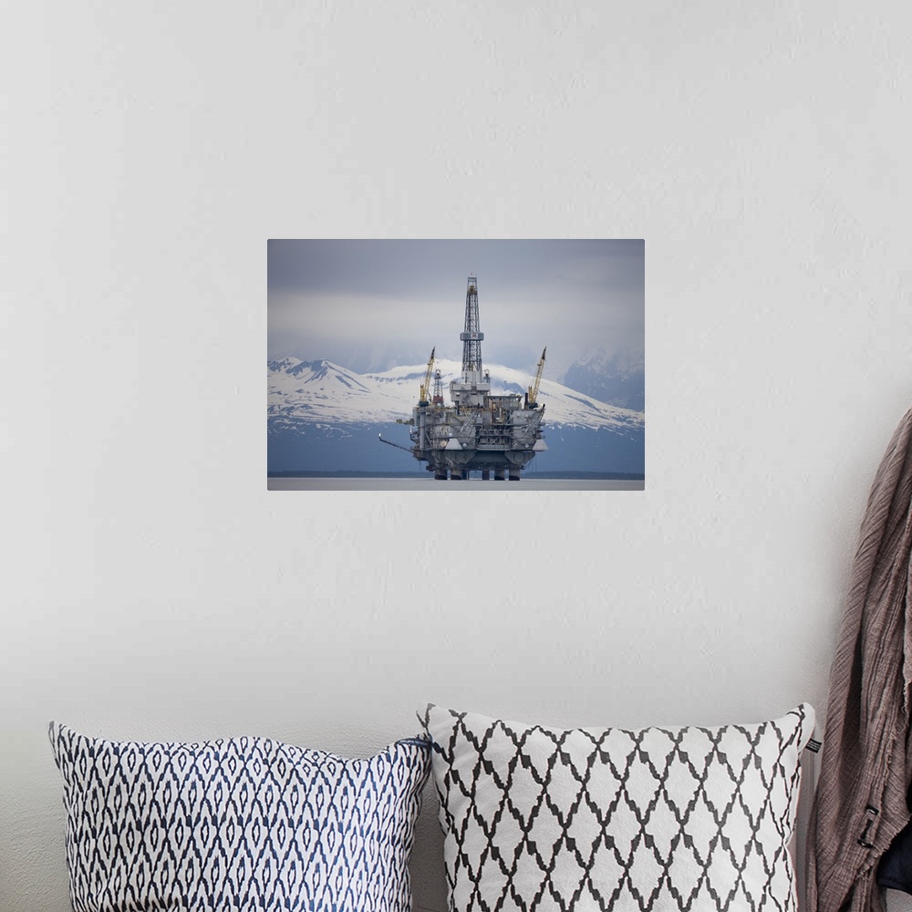 A bohemian room featuring USA, Alaska. Offshore oil drilling rig in Cook Inlet and distant Alaska Range peaks on summer eve...