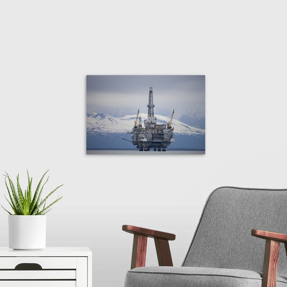 A modern room featuring USA, Alaska. Offshore oil drilling rig in Cook Inlet and distant Alaska Range peaks on summer eve...