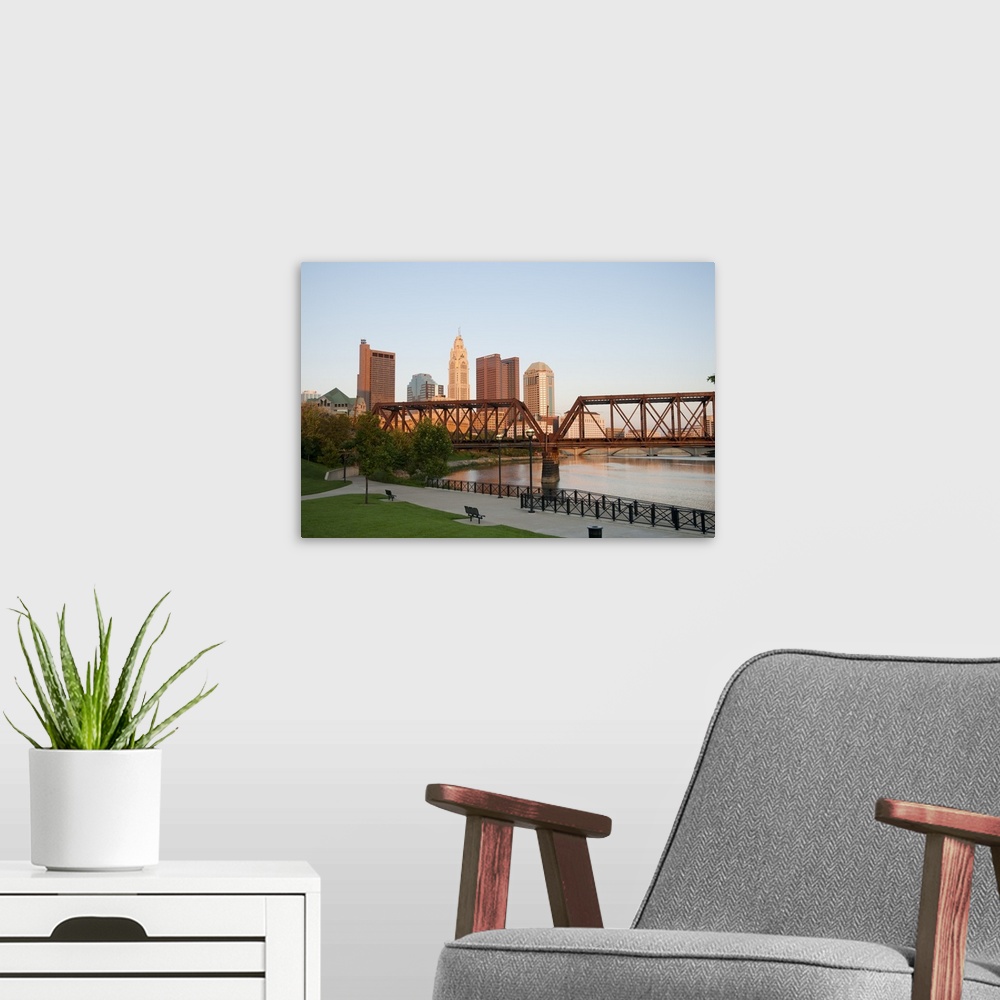 A modern room featuring USA, Ohio, Columbus: City skyline and the Scioto River.
