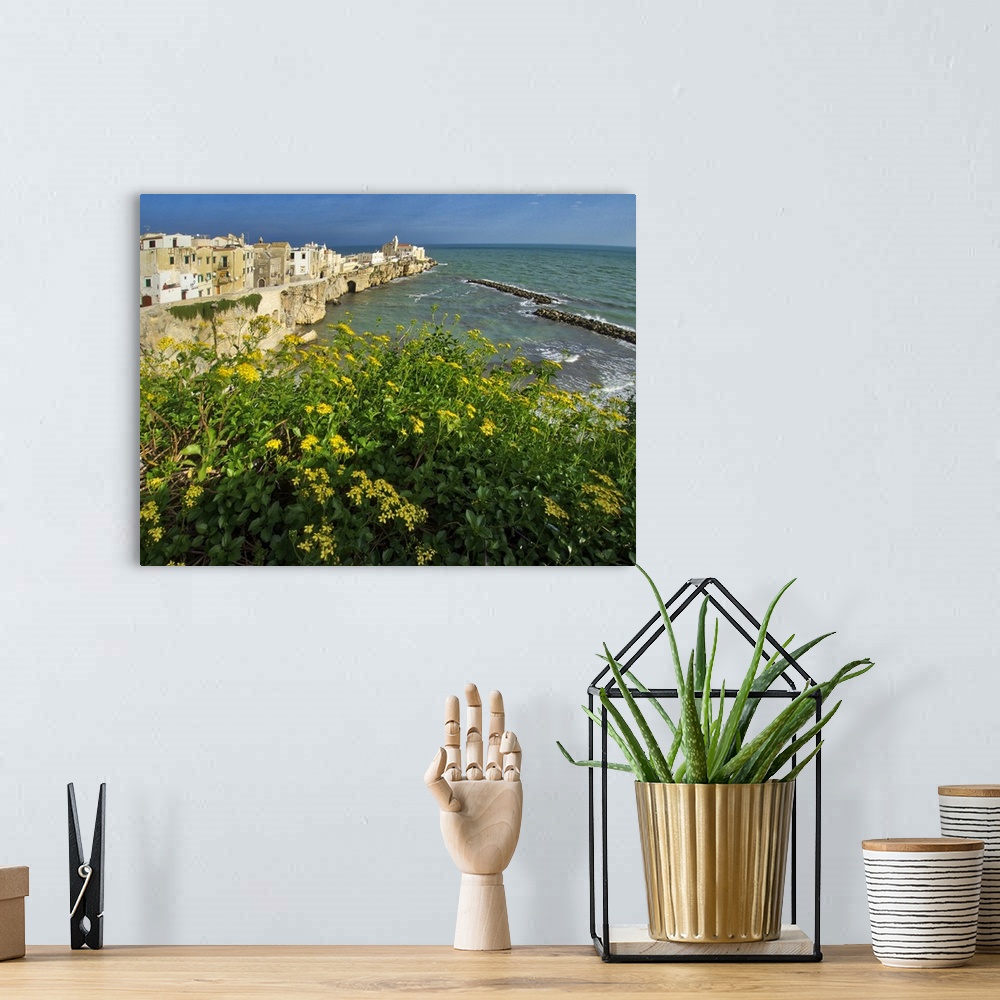 A bohemian room featuring Old town of Vieste cityscape with medieval church at the tip of the peninsula of this fishing vil...