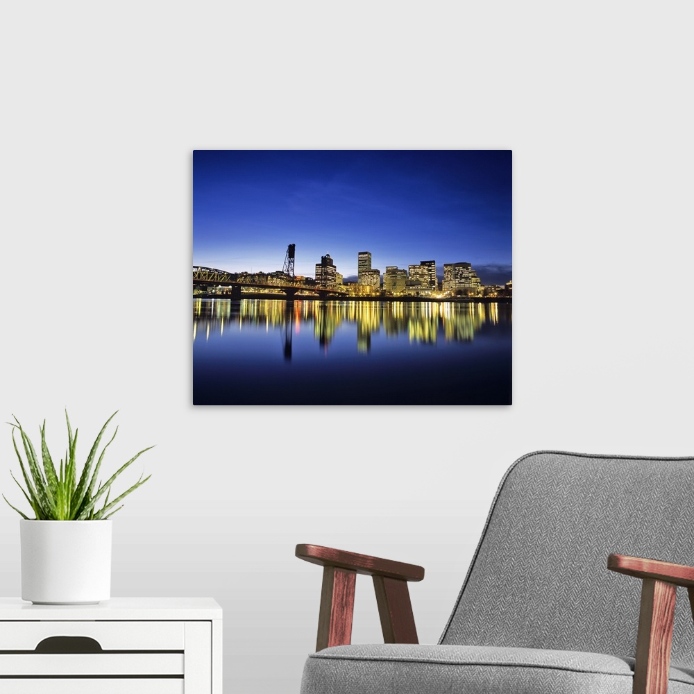 A modern room featuring Portland Oregon skyline from across the Willamette River