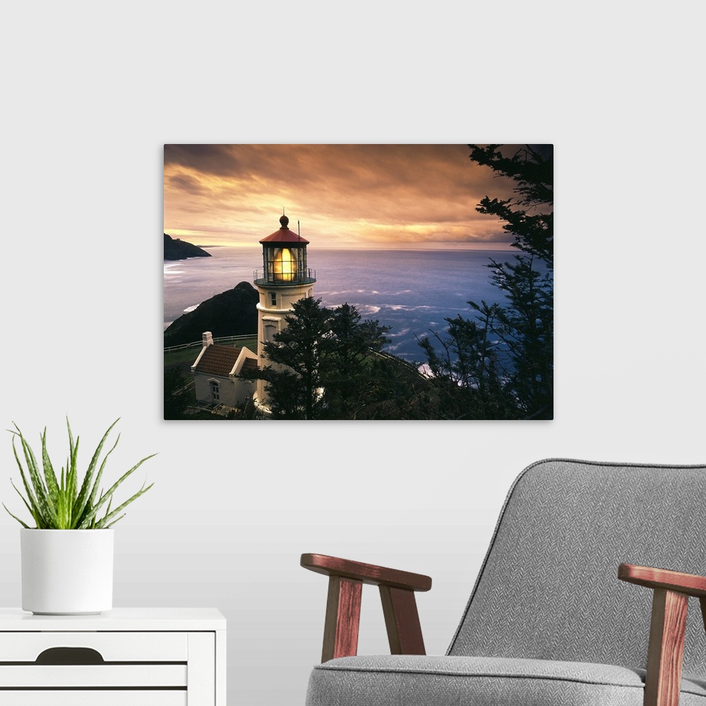 A modern room featuring Oregon, View of Heceta Head Lighthouse at sunset.