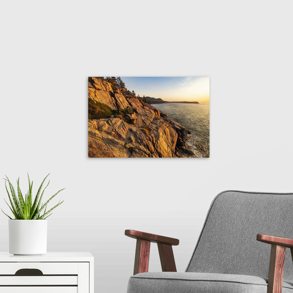 A modern room featuring Otter Cliffs at sunrise in Acadia National Park, Maine, USA.