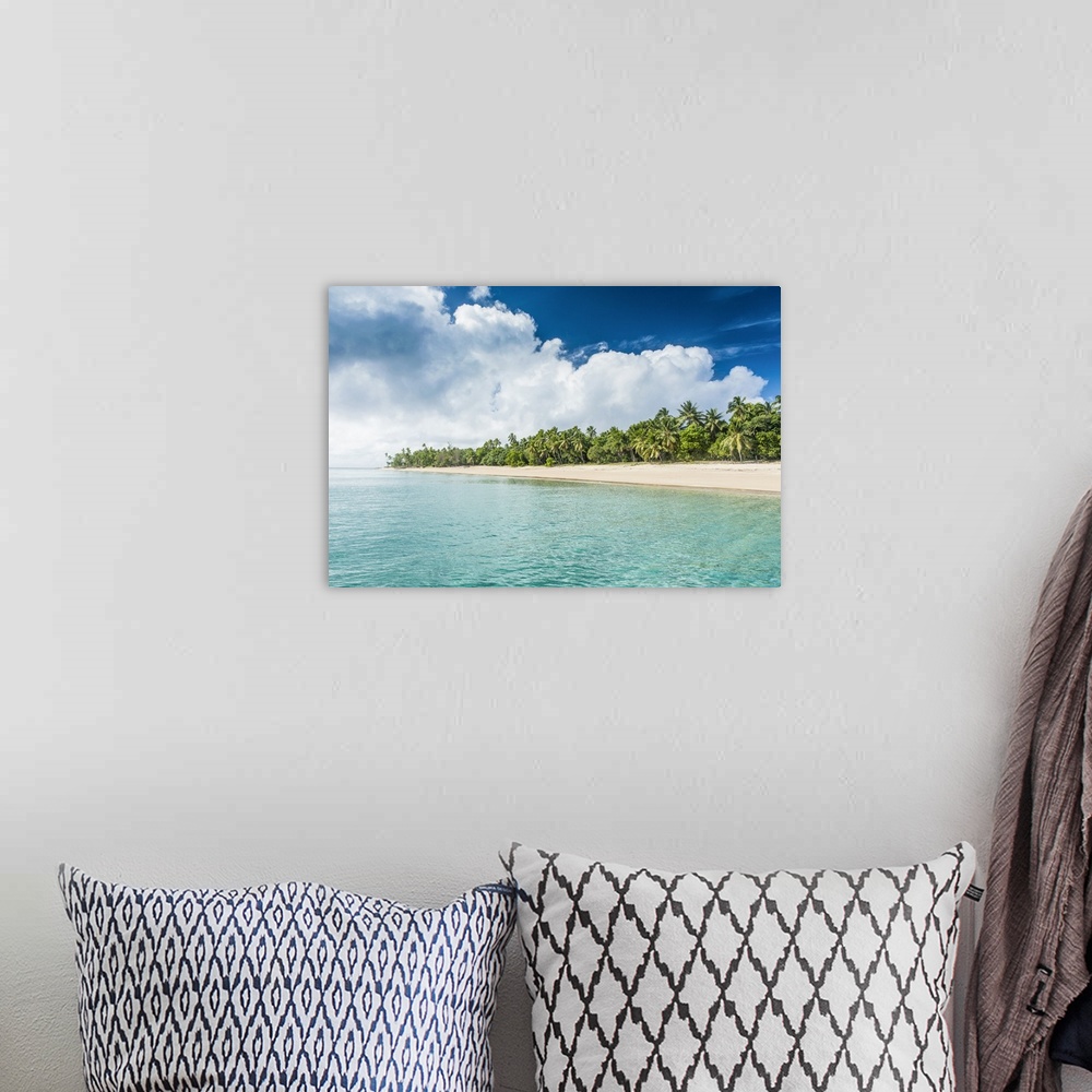 A bohemian room featuring Palm fringed white sand beach in Ha'apai, Ha'apai islands, Tonga, South Pacific.