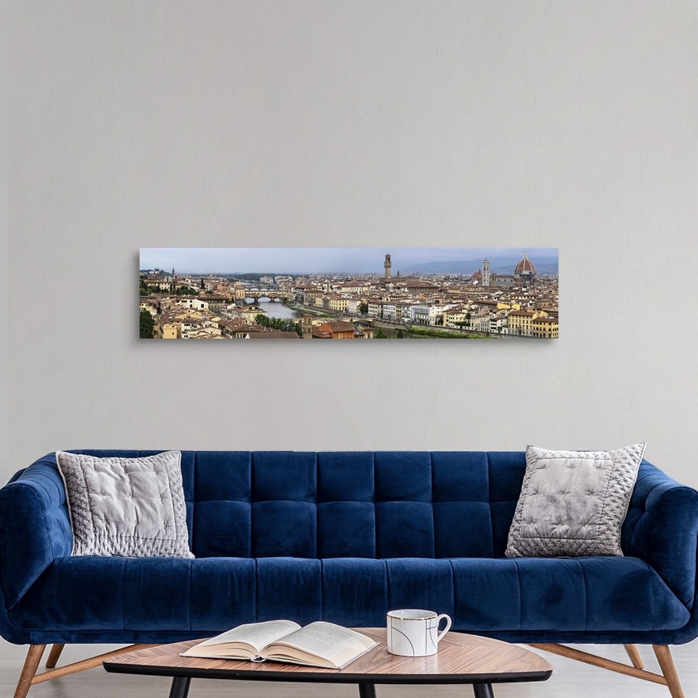 A modern room featuring Panoramic view of Florence, Italy along the Arno River amd Ponte Vecchio (Old Bridge).