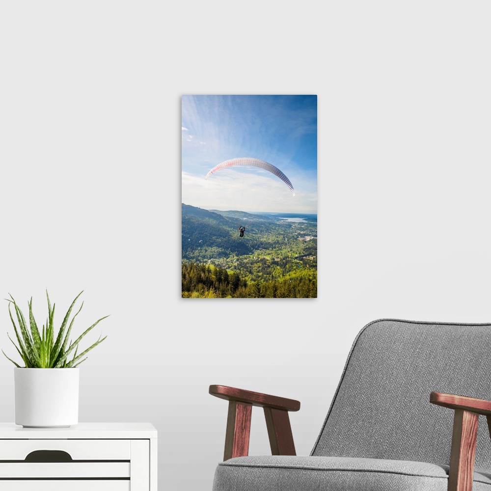 A modern room featuring United States, Washington, Issaquah. Paragliders launch from Tiger Mountain and soar westward tow...