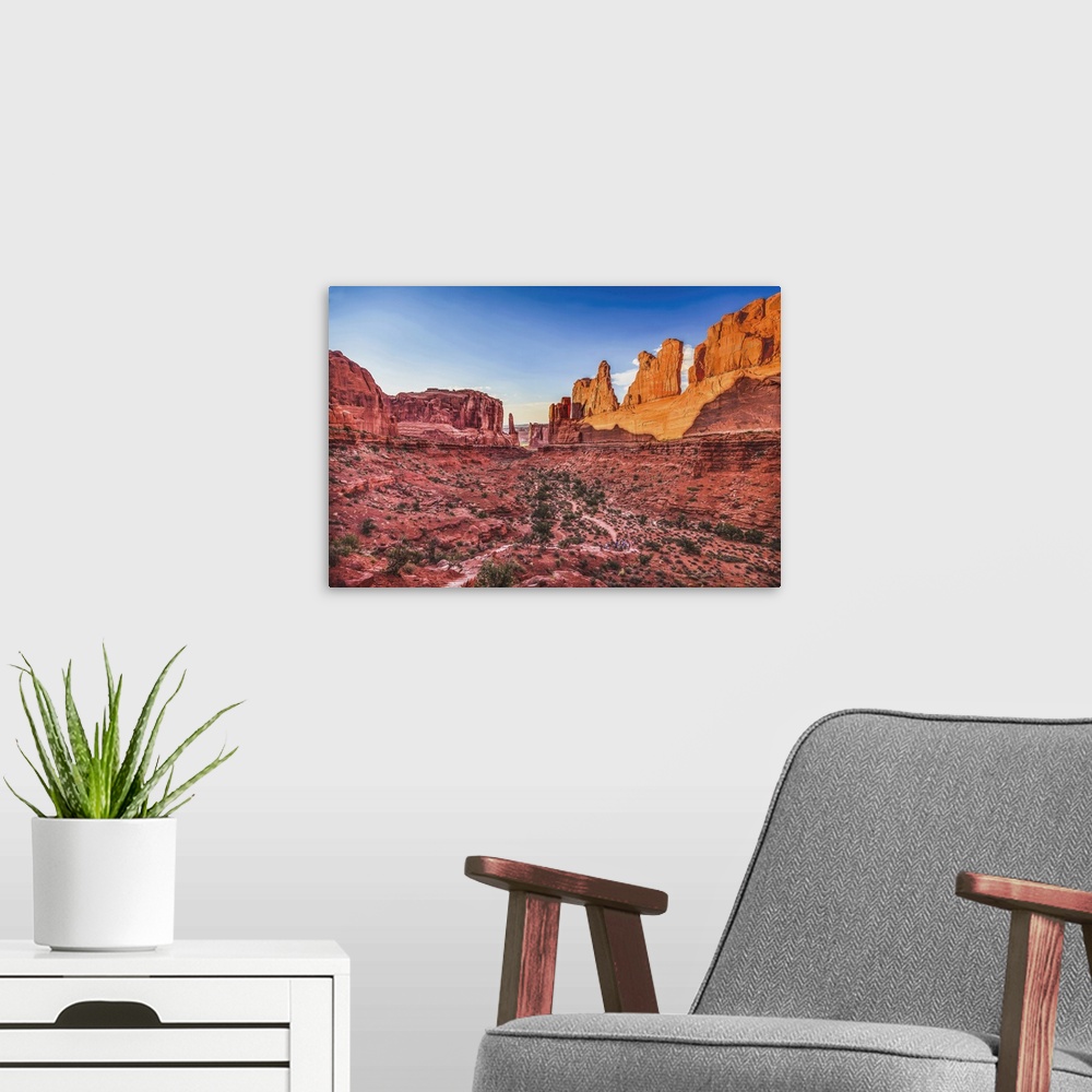 A modern room featuring Park Avenue Section, Arches National Park, Moab, Utah, USA. Classic sandstone walls, hoodoos and ...