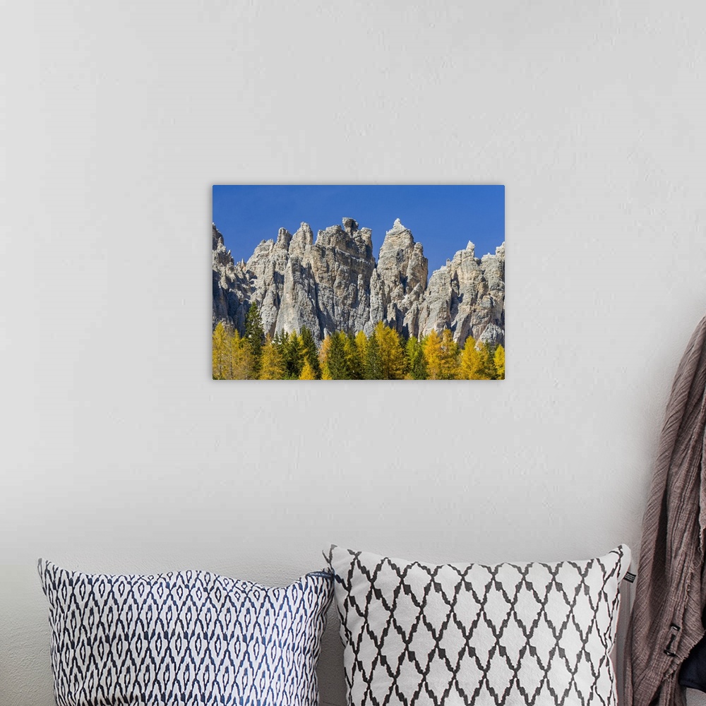 A bohemian room featuring Peaks of the southern Civetta mountain range rising over Val dei Cantoni, in the dolomites of the...