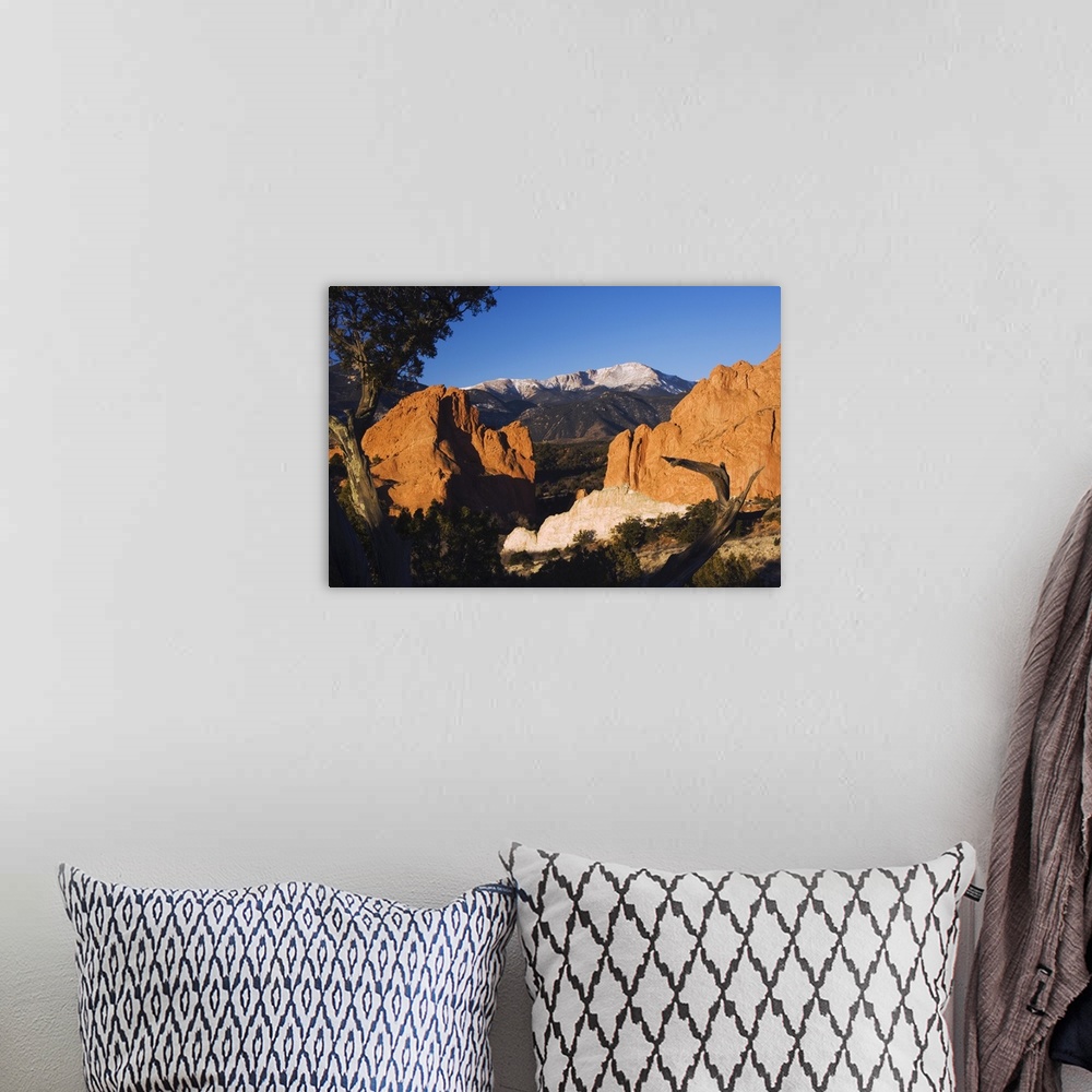 A bohemian room featuring Rock formation and Pikes Peak at Sunrise, Garden of The Gods National Landmark, Colorado Springs,...